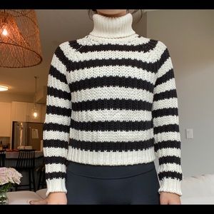 Striped black and white knit sweater.